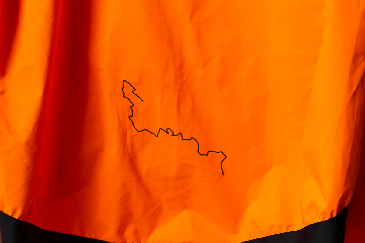 Albion Rain Jacket for road cycling in bright orange