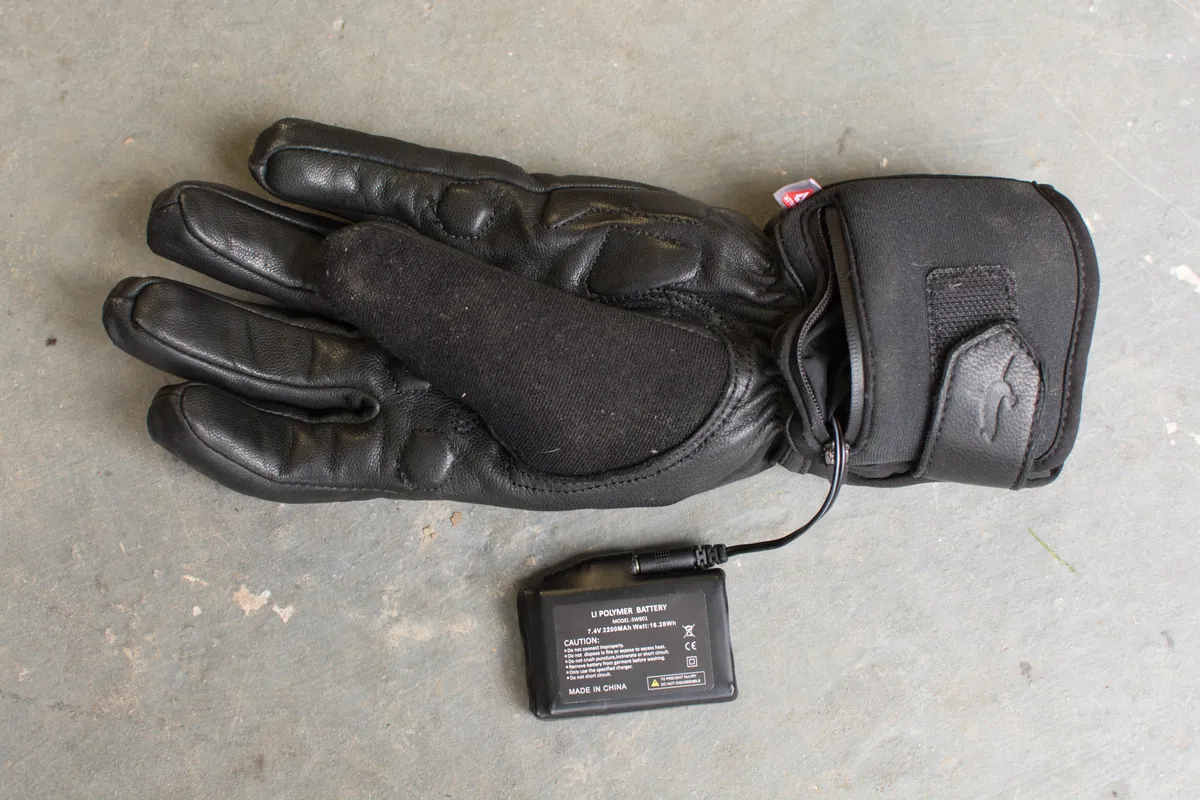 Glove with battery removed but still connected