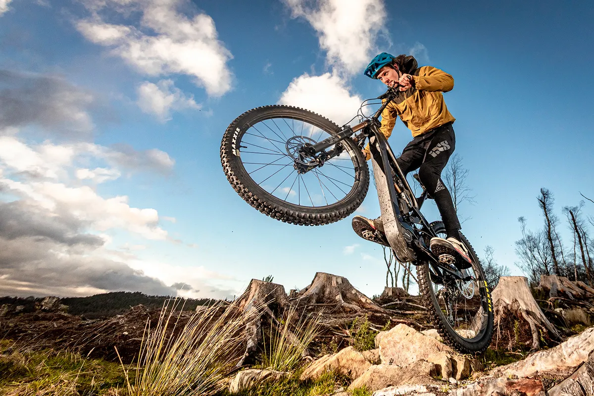 Cyclist riding the The YT Decoy Elite full-suss mountain ebike