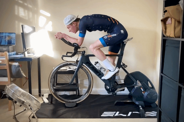 Simon Bromley riding a time trial bike on a smart trainer