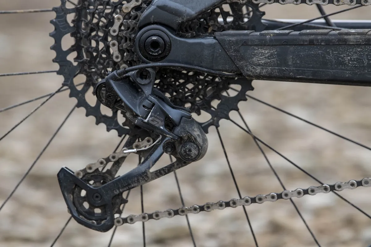 The Trek Slash 8 full suspension mountain bike is equipped with GX Eagle 12-speed transmission