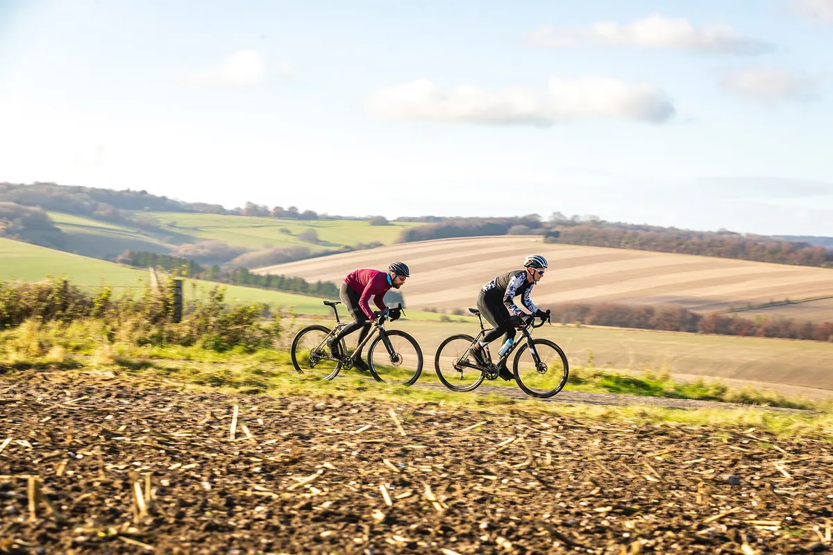 Two cyclists riding across the Salisbury Plains