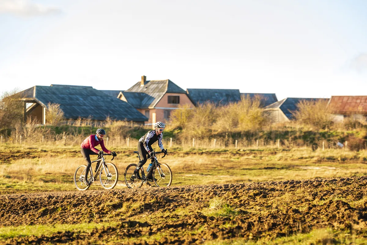 Two cyclists riding across the Salisbury Plains