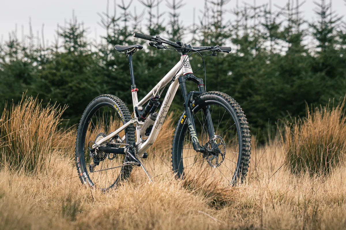 Angled pack shot of the Bird Aether 9 full suspension mountain bike