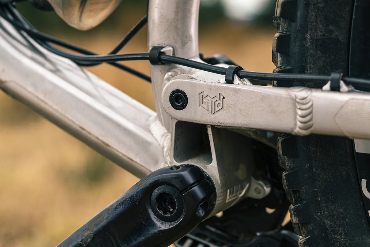 The Bird logo is stamped into the frame of the Bird Aether 9 full suspension mountain bike