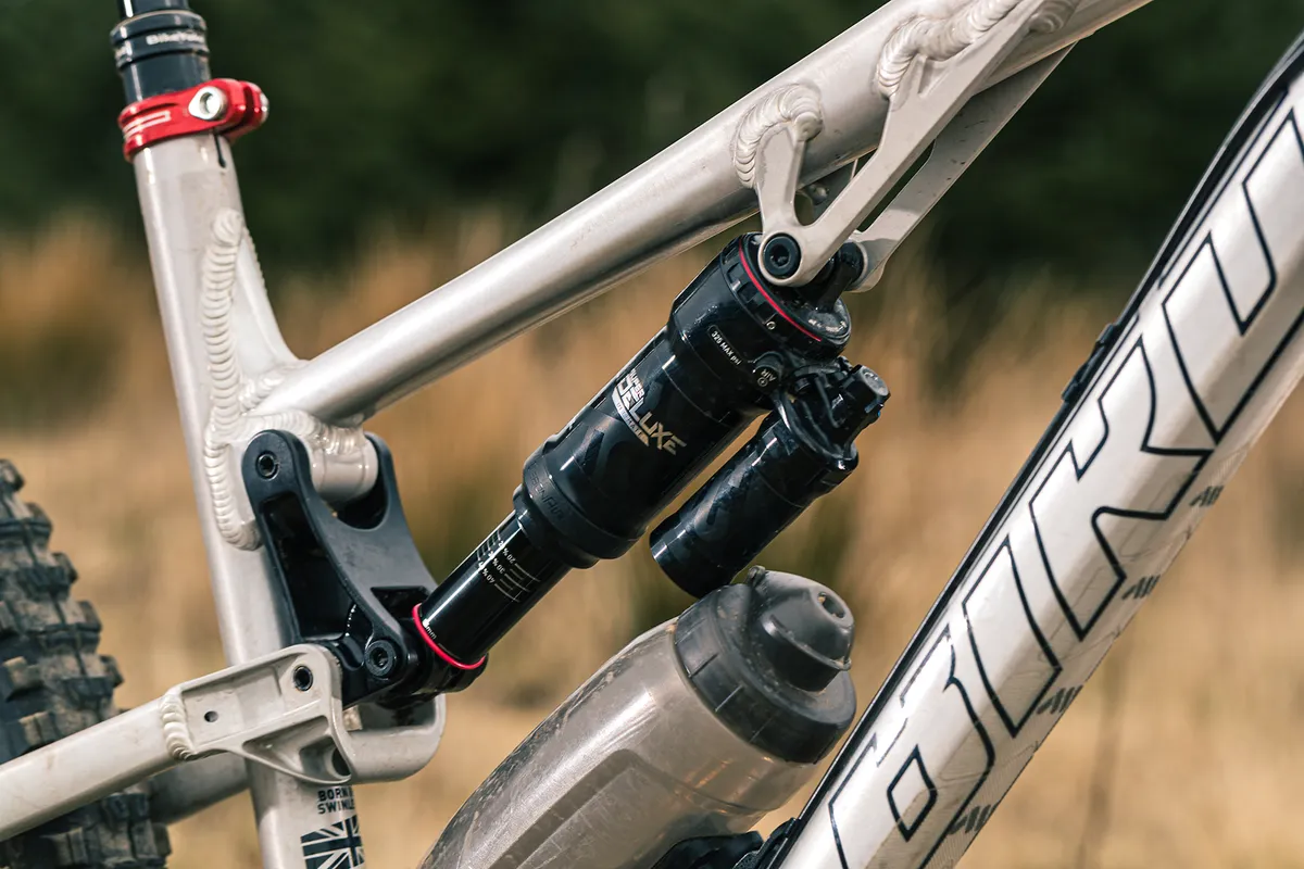 The Bird Aether 9 full suspension mountain bike is equipped with a RockShox Super Deluxe Ultimate rear shock