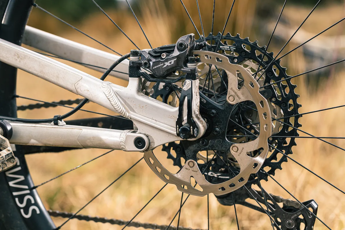 The Bird Aether 9 full suspension mountain bike is equipped with Shimano XT four-pot disc brakes