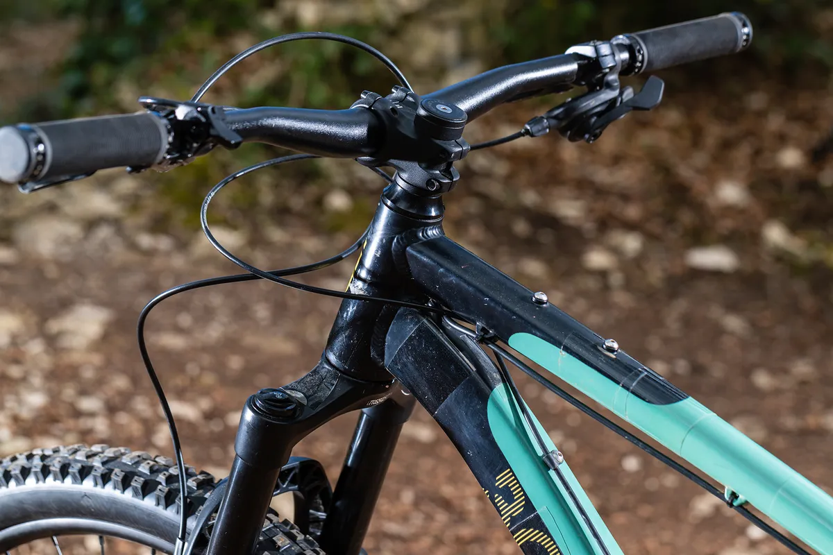 The Bombtrack Cale AL hardtail mountain bike frame is frame is festooned with mounting points for luggage