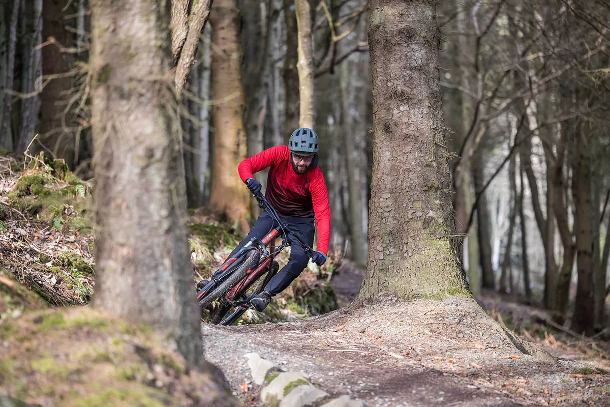 Male cyclist in red top riding the Carrera Fury hardtail mountain bike 