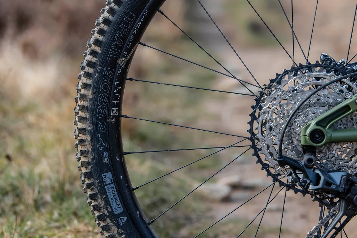 The Cotic RocketMAX Gen3 Silver SLX full suspension mountain bike is equipped with Trail Boss tyre on the rear wheel