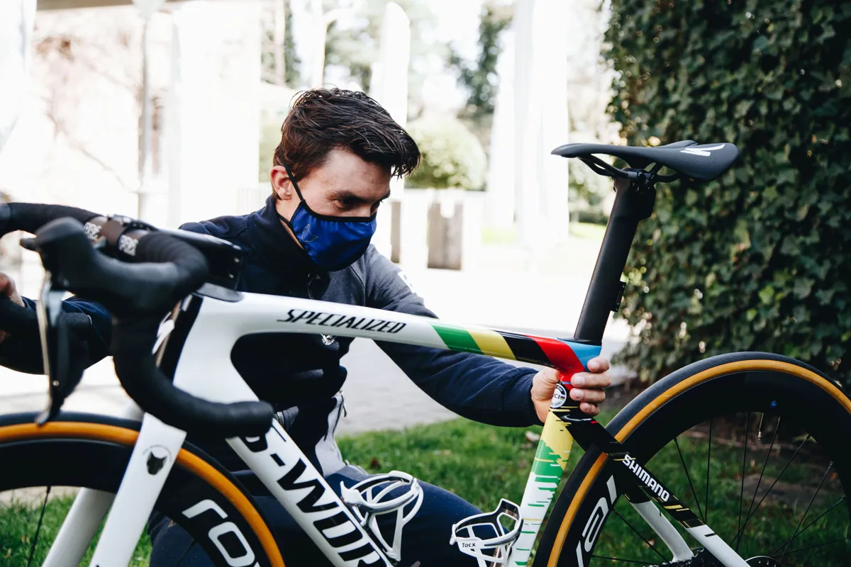 Julian Alaphilippe admiring his custom painted Specialized S-Works Tarmac SL7