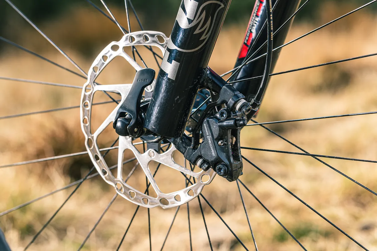 Shimano Deore 4-pot disc brakes with 180mm rotors