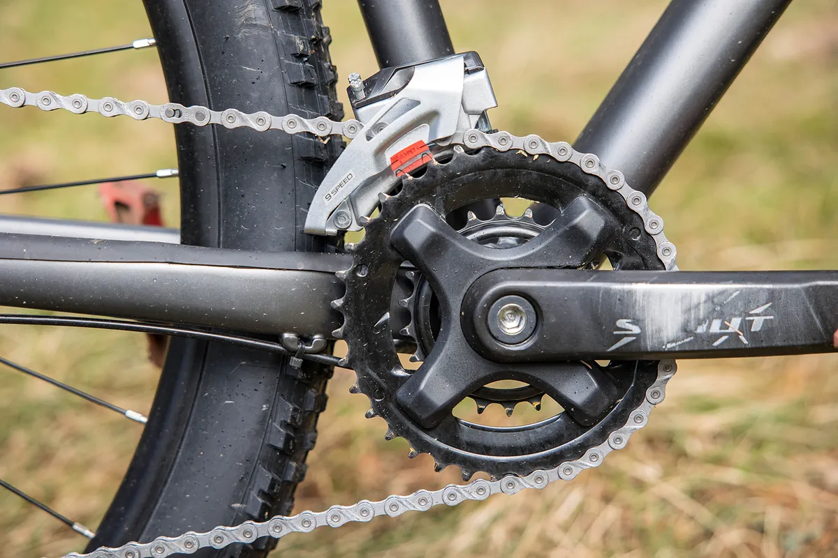 The Specialized Rockhopper Comp hardtail mountain bike has a double front chain ring