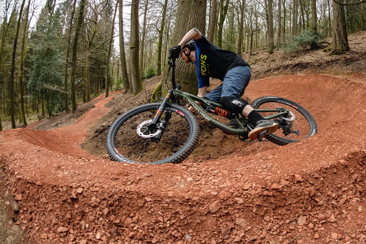 Cyclist riding the Verderers Blue Trail, Forest of Dean