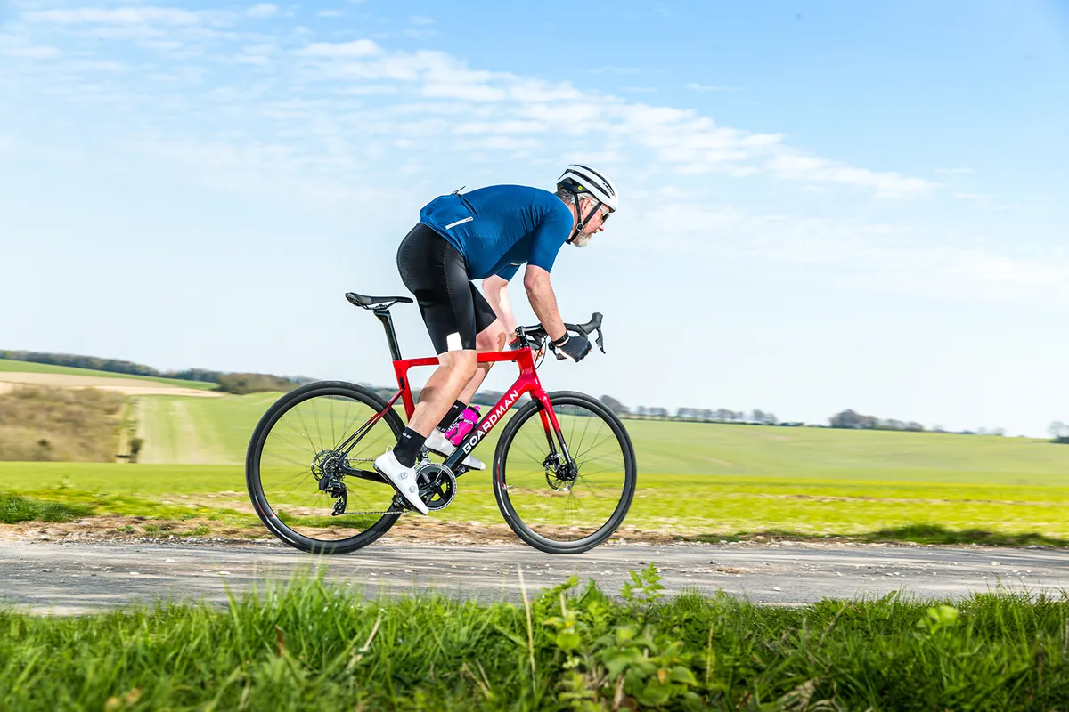 Cyclist in blue top riding the Boardman SLR 9.4 AXS Disc Carbon - BikeRadar BOTY 2021