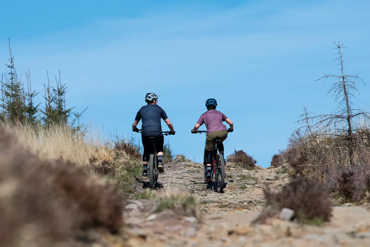 Two cyclists riding the Beast of Burden climb in Wales