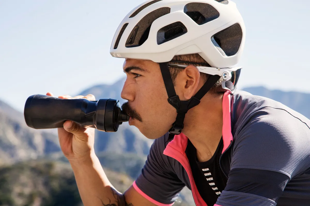 Cyclist drinking from a bottle