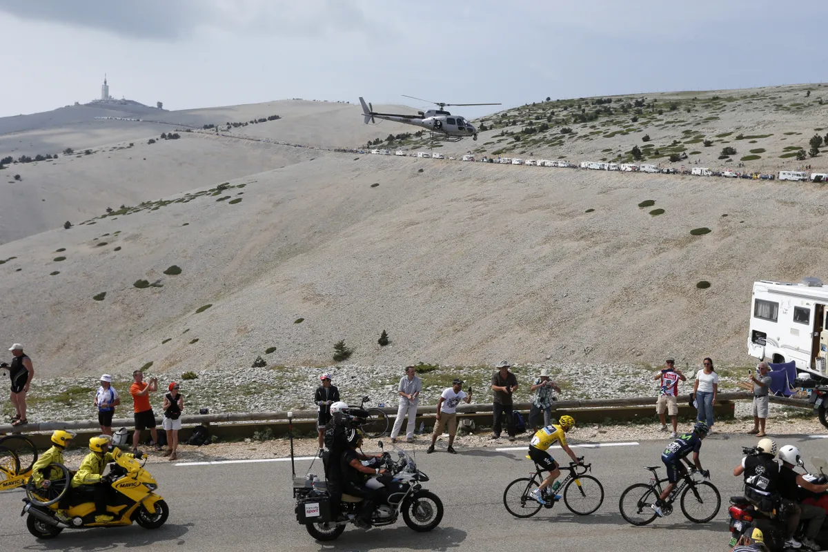 Overall leader's yellow jersey Britain's Christopher Froome (L) rides after Colombia's Nairo Quintana (R) during the 242.5 km fifteenth stage of the 100th edition of the Tour de France cycling race on July 14, 2013 between Givors and Mont Ventoux, southeastern France. AFP PHOTO / JOEL SAGET (Photo credit should read JOEL SAGET/AFP via Getty Images)