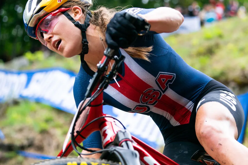 Kate Courtney riding the XC cross-country race at theUCI Mountain Bike World Championships