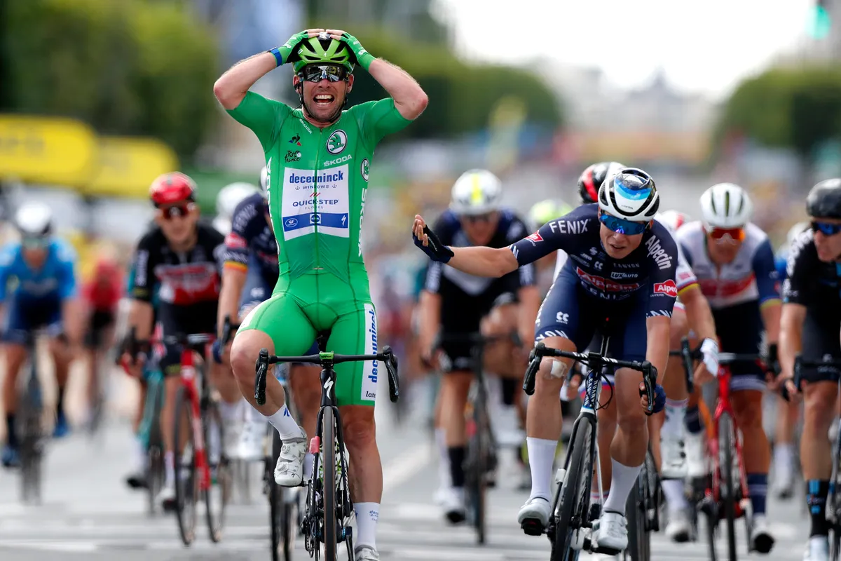 CHATEAUROUX, FRANCE - JULY 01: Mark Cavendish of The United Kingdom and Team Deceuninck - Quick-Step Green Points Jersey celebrates at arrival ahead of Jasper Philipsen of Belgium and Team Alpecin-Fenix during the 108th Tour de France 2021, Stage 6 a 160,6km stage from Tours to Châteauroux / @LeTour / #TDF2021 / on July 01, 2021 in Chateauroux, France. (Photo by Guillaume Horcajuelo - Pool/Getty Images)
