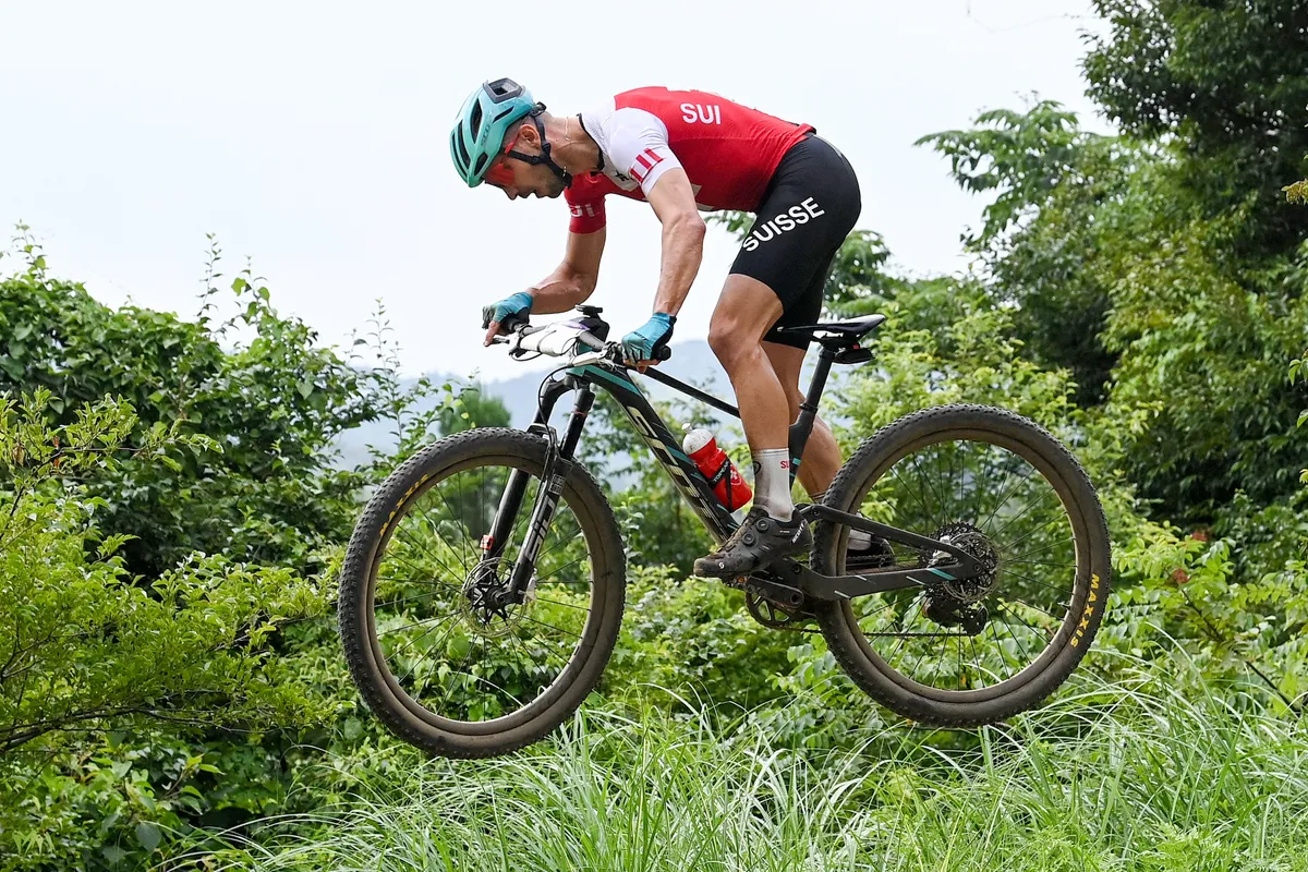Nino Schurter riding the men's XC race at the Tokyo 2020 Olympic Games