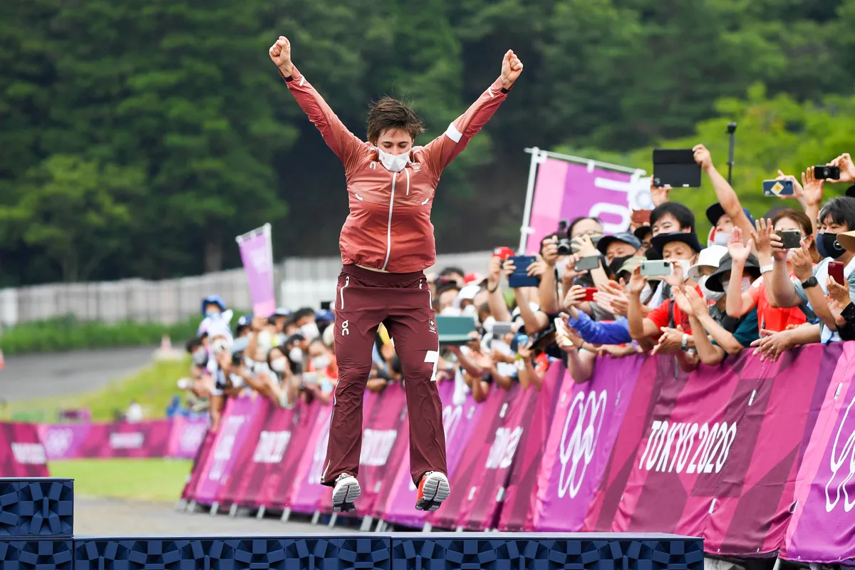 Switzerland's Linda Indergand jumping on the podium at the Tokyo 2020 Olympic Games