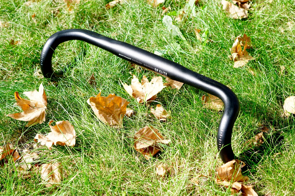 Bontrager Elite Road Handlebar photographed on grass with brown autumn leaves