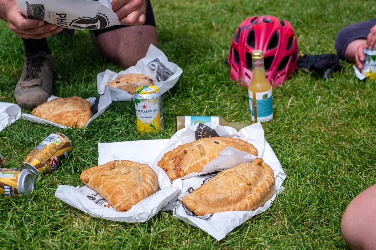 A stop for pasties in Porthleven during a recce ride of Cycling UK's West Kernow Way, June 2021. The 230km route is part of the EU-funded EXPERIENCE project to develop sustainable year-round tourism activities in Cornwall.