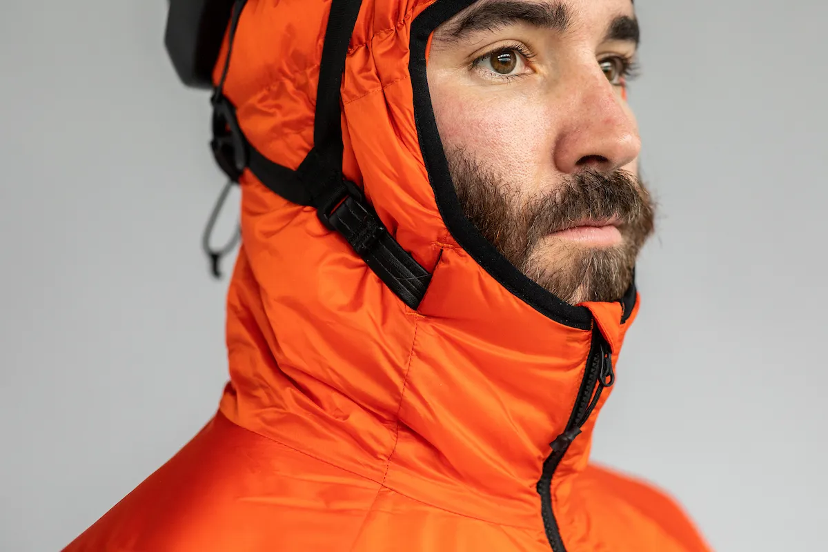 Close up of hood on Albion Zoa insulated jacket that has eyelets for helmet straps