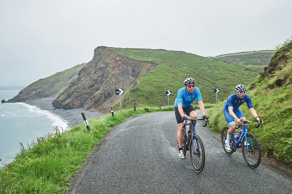 Two male cyclists riding through Cornwall