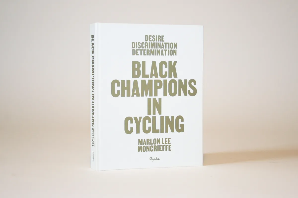 Black Champions in cycling book photographed against white background