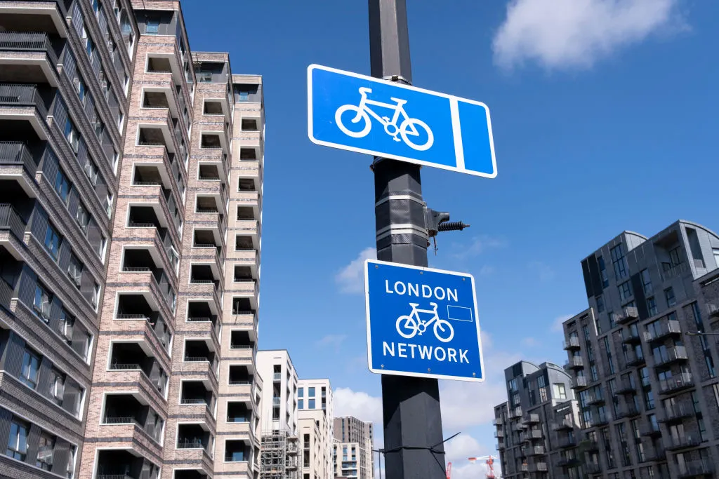 Cycle network sign beneath new resedential properties in London