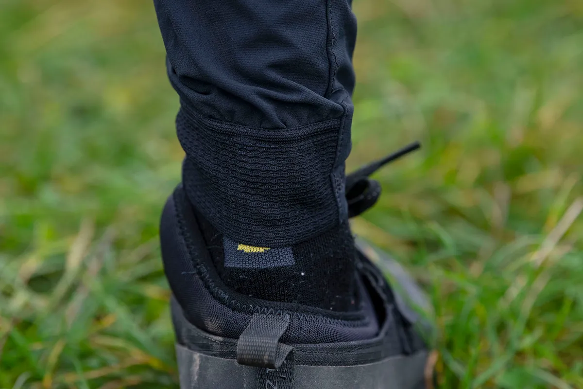Thanks to the elastic portion of the ankle cuff, getting the Trail Pants on and off isn't too bad.