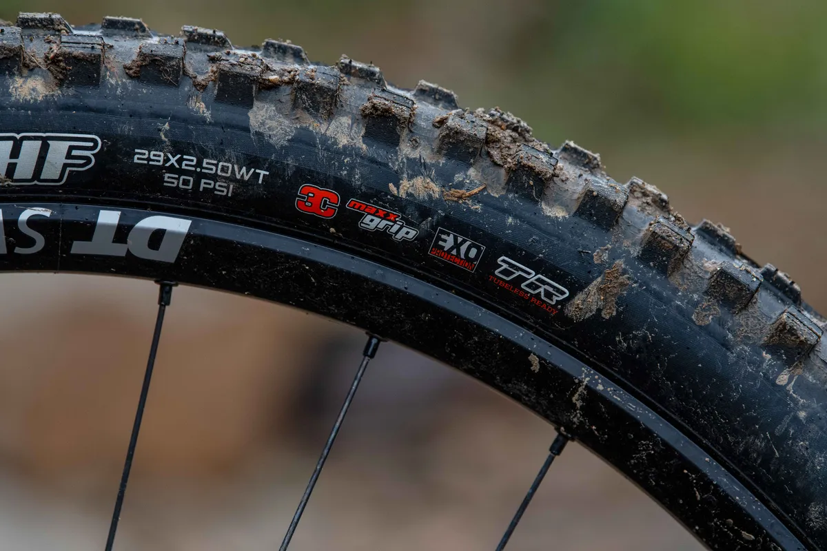 The MaxxGrip compound of the Maxxis DHF front tyre is great at added traction in slippery conditions, but you pay a price for that in slower rolling speeds.