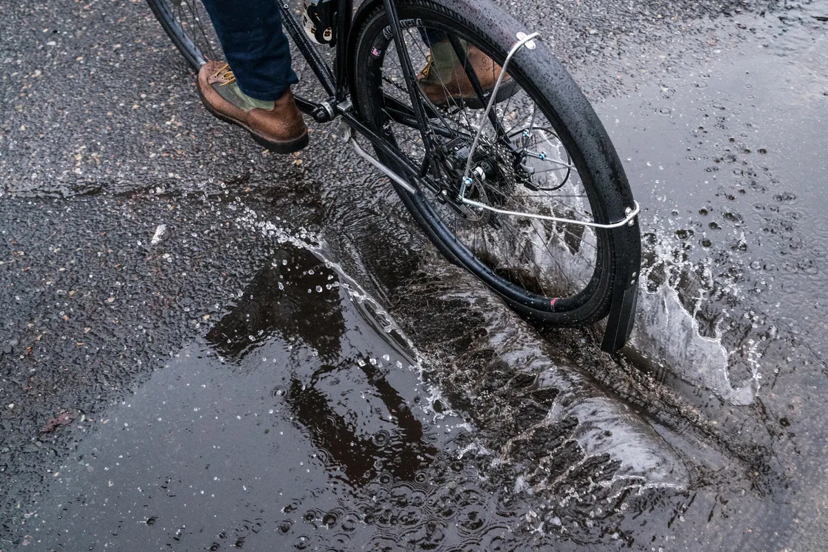 Portland Design Works metal fenders on a commuter bike puddle
