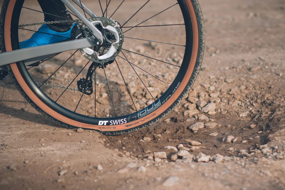 Tyre hitting a pothole on a gravel bike