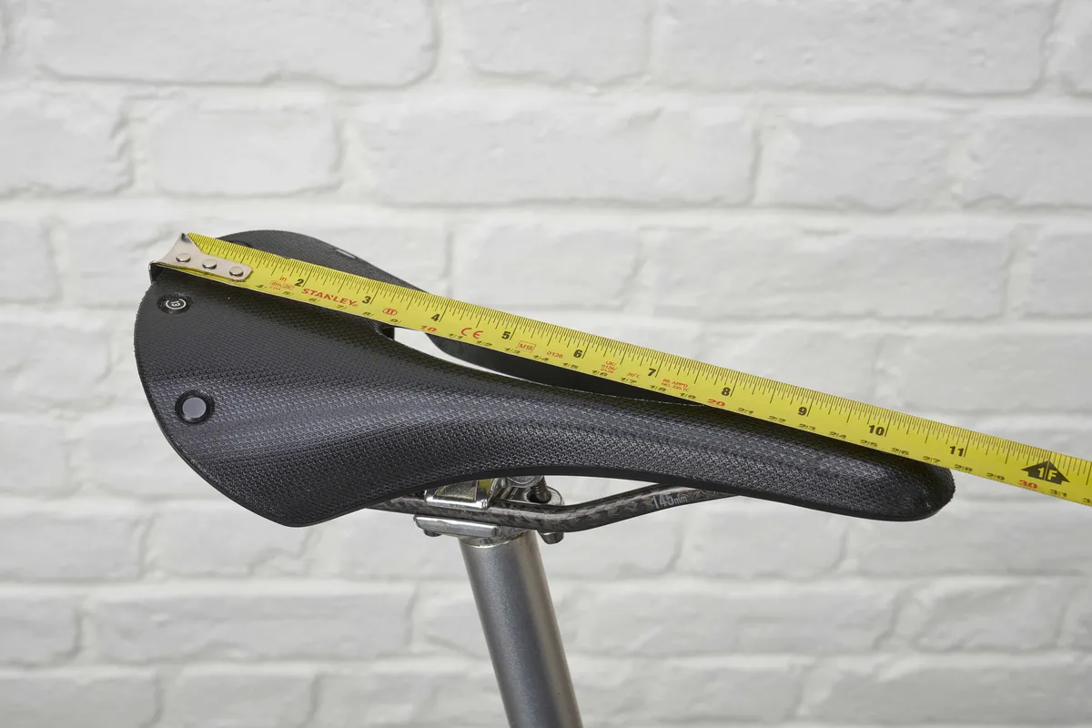 Tape measure on top of bike saddle