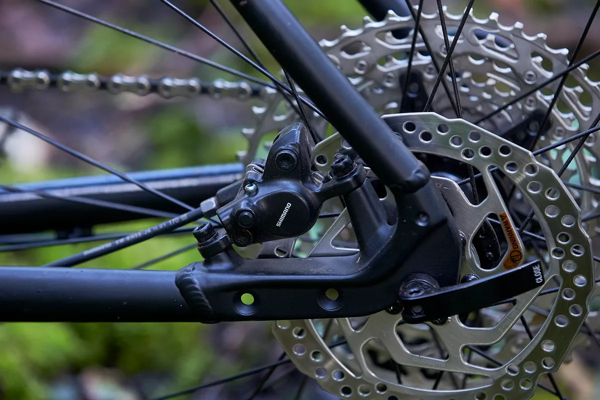 The Voodoo Bizango hardtail trail mountain bike is equipped with Shimano M200 disc brakes