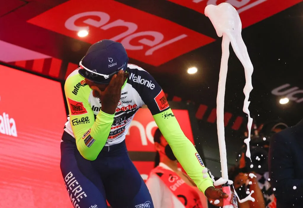 Biniam Girmay pulled out of the Giro d'Italia before the start of the 11th stage with an eye injury he suffered when he was struck by a champagne cork.
