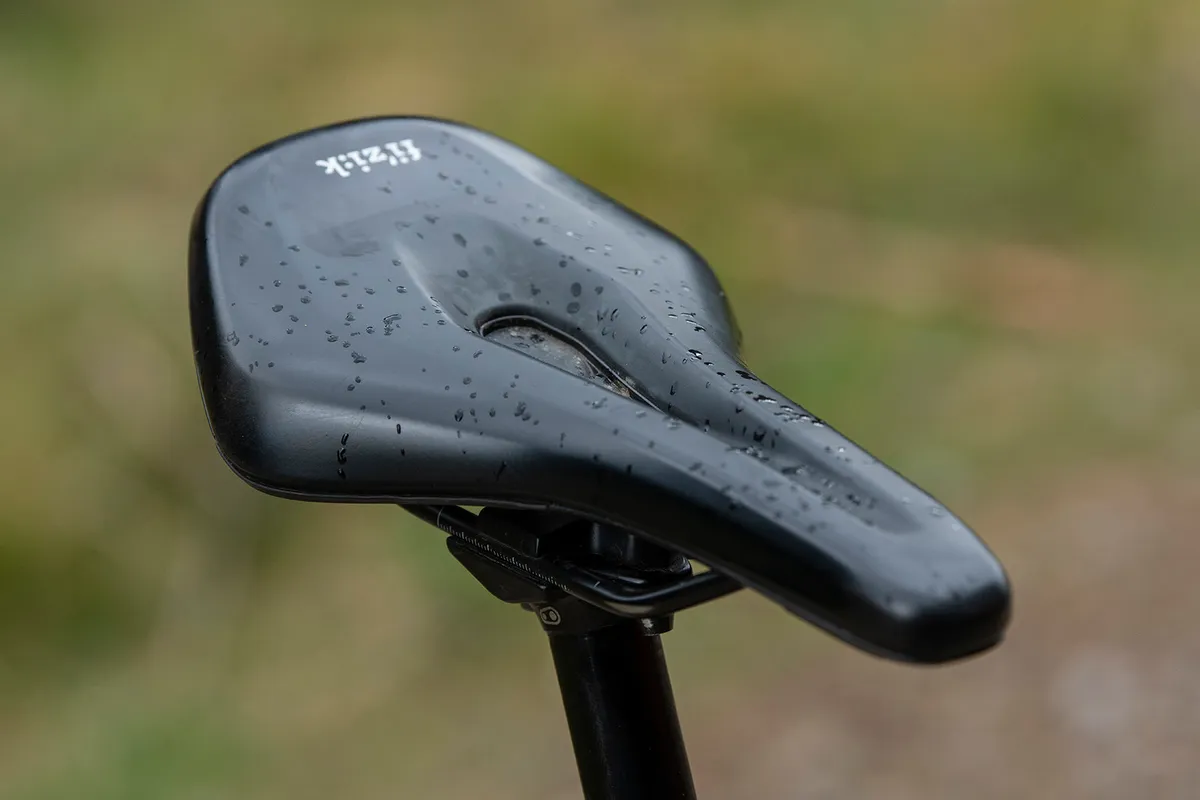 The Whyte E-180 RS v3 full suspension eMTB is equipped with a Fizik Terra Aidon saddle