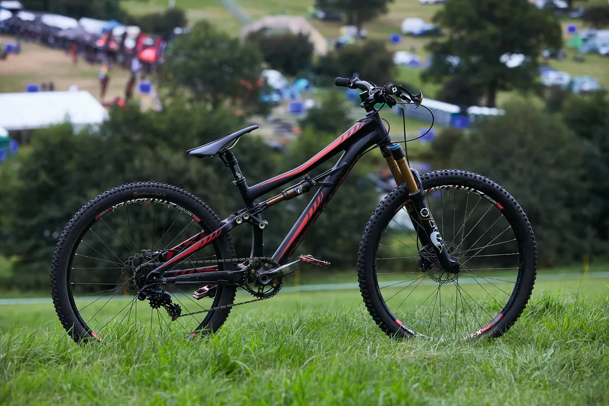 Four-cross mountain bike photographed on grass