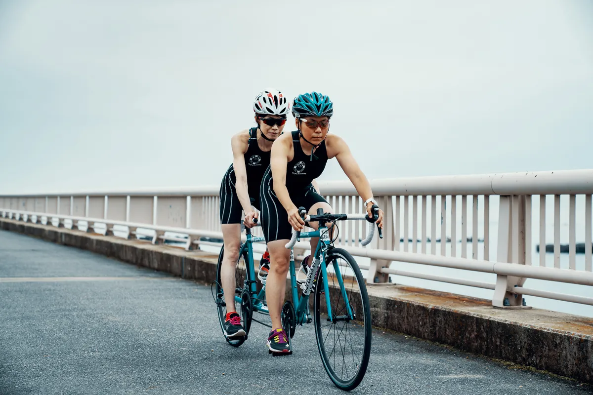 Two women on a tandem