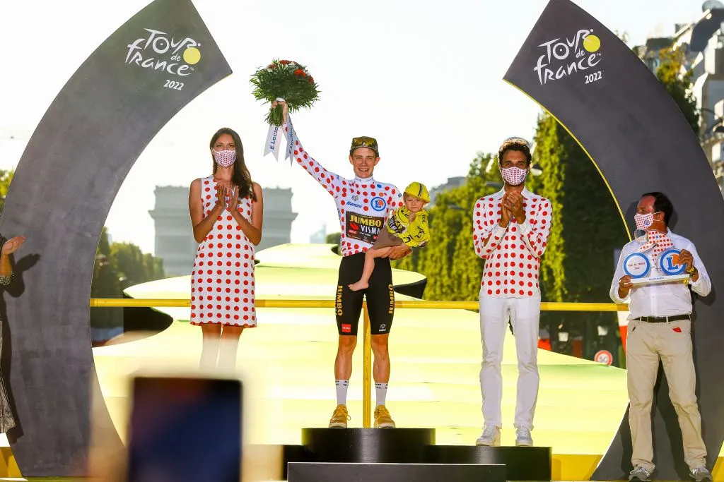 Danish Jonas Vingegaard of Jumbo-Visma celebrates on the podium in the red polka-dot jersey for best climber after stage 21, the final stage of the Tour de France cycling race, from Paris la Defense Arena to Paris Champs-Elysees, France, on Sunday 24 July 2022. This year's Tour de France takes place from 01 to 24 July 2022.