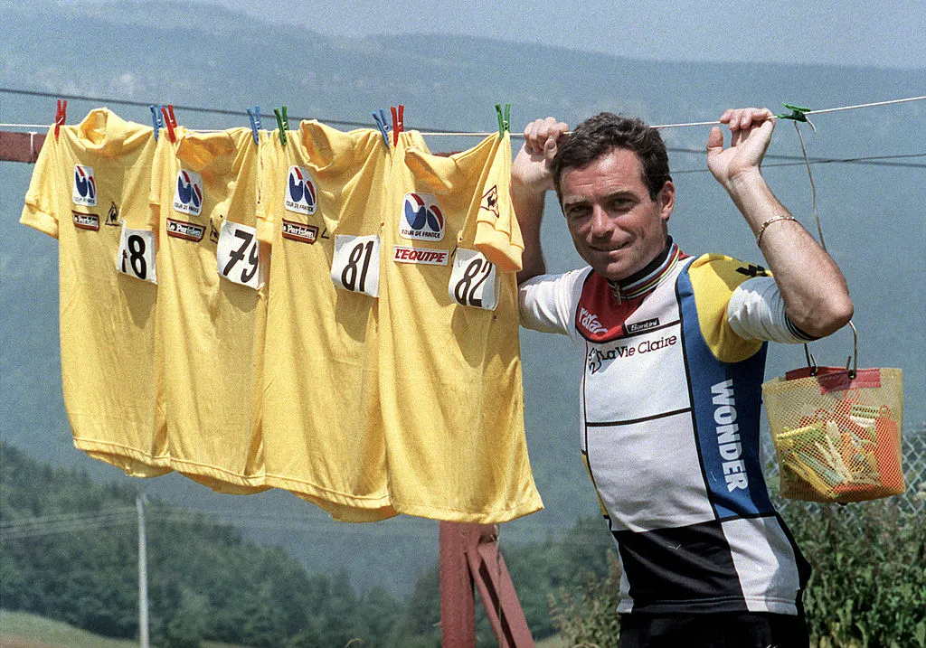 Frenchman Bernard Hinault, the overall leader of the 72nd Tour de France displays during a day-off on July 12, 1985 in Villard-de-Lans, his four yellow jerseys won in previous years (1978, 1979, 1981, 1982). Hinault won the 1985 edition as well to tie the record set by his compatriot Jacques Anquetil and Belgian rider Eddy Merckx