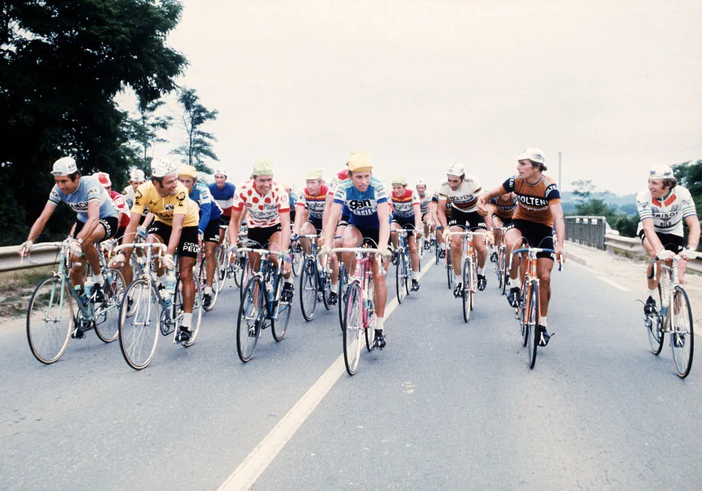 From left: Felice Gimondi from Italy, Frenchman Bernard Thevenet, wearing the Yellow Jersey of the leader, Lucien Van Impe from Belgium, wearing the red and white Polka Dot Jersey of the best climber, Dutch Joop Zoetelmelk and Eddy Merckx from Belgium, ride side by side during the 62nd Tour de France from 26 June to 20 July 1975. AFP PHOTO (Photo by - / AFP) (Photo credit should read -/AFP via Getty Images)