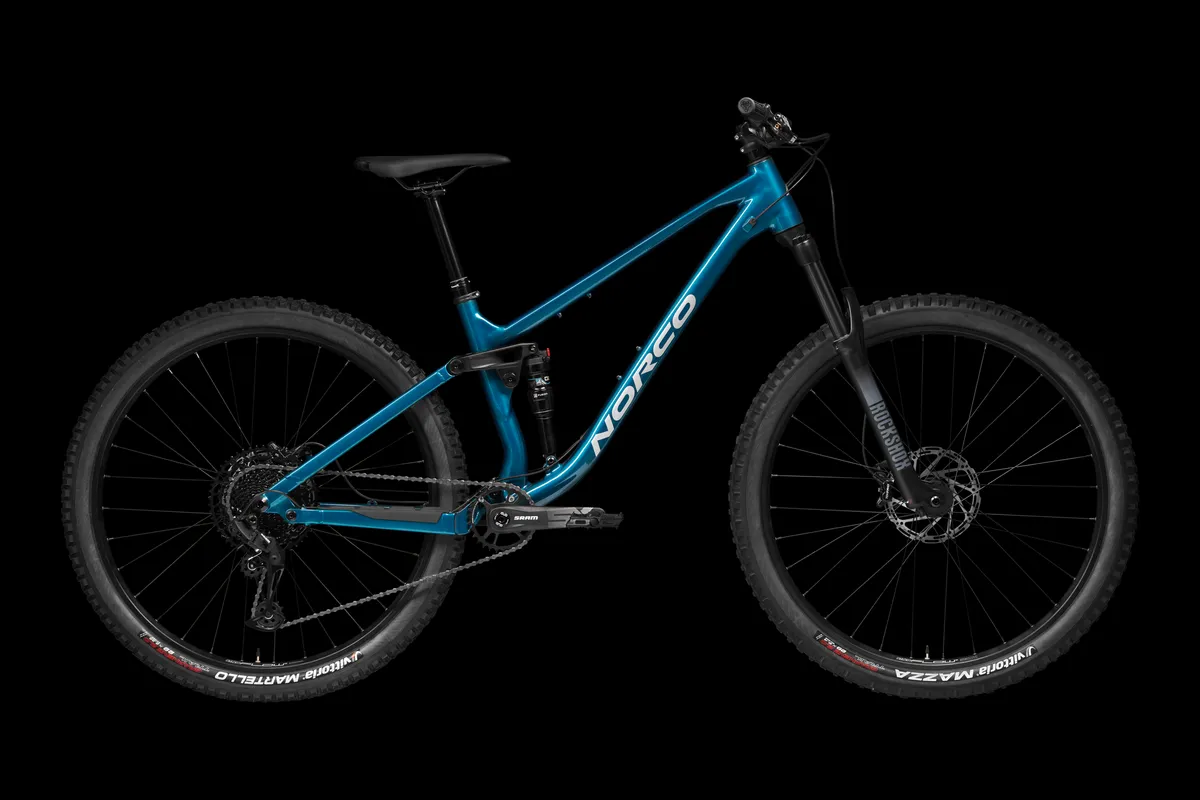 Norco Fluid FS 3 in Blue Silver against a black background