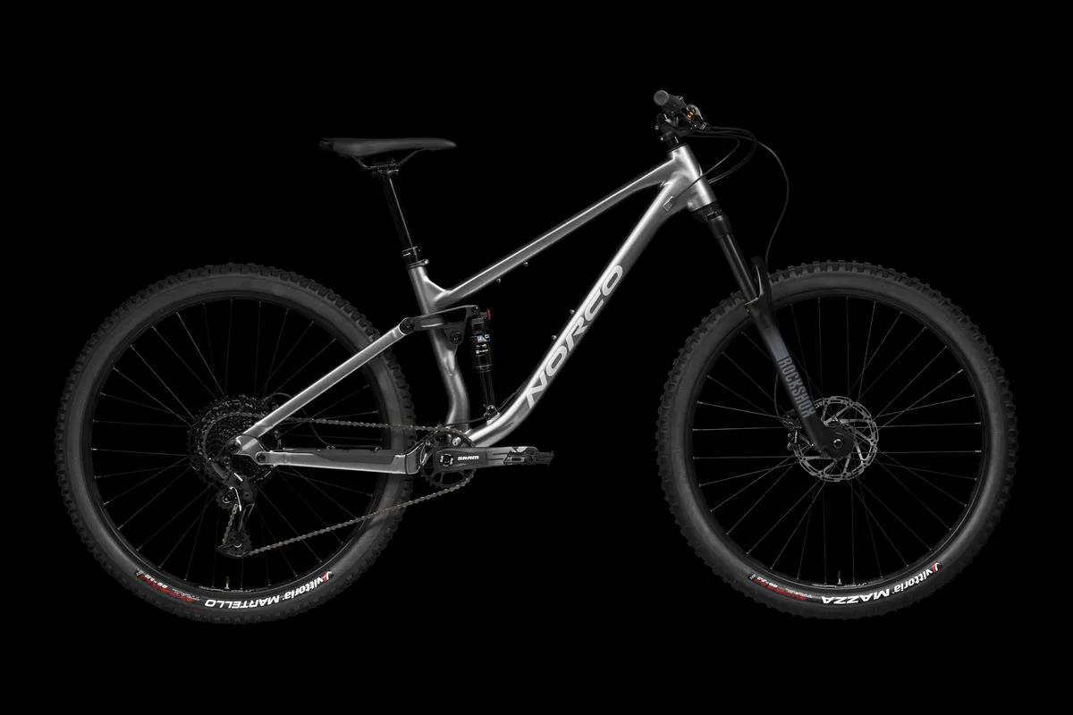 Norco Fluid FS 3 in Grey Silver against a black background