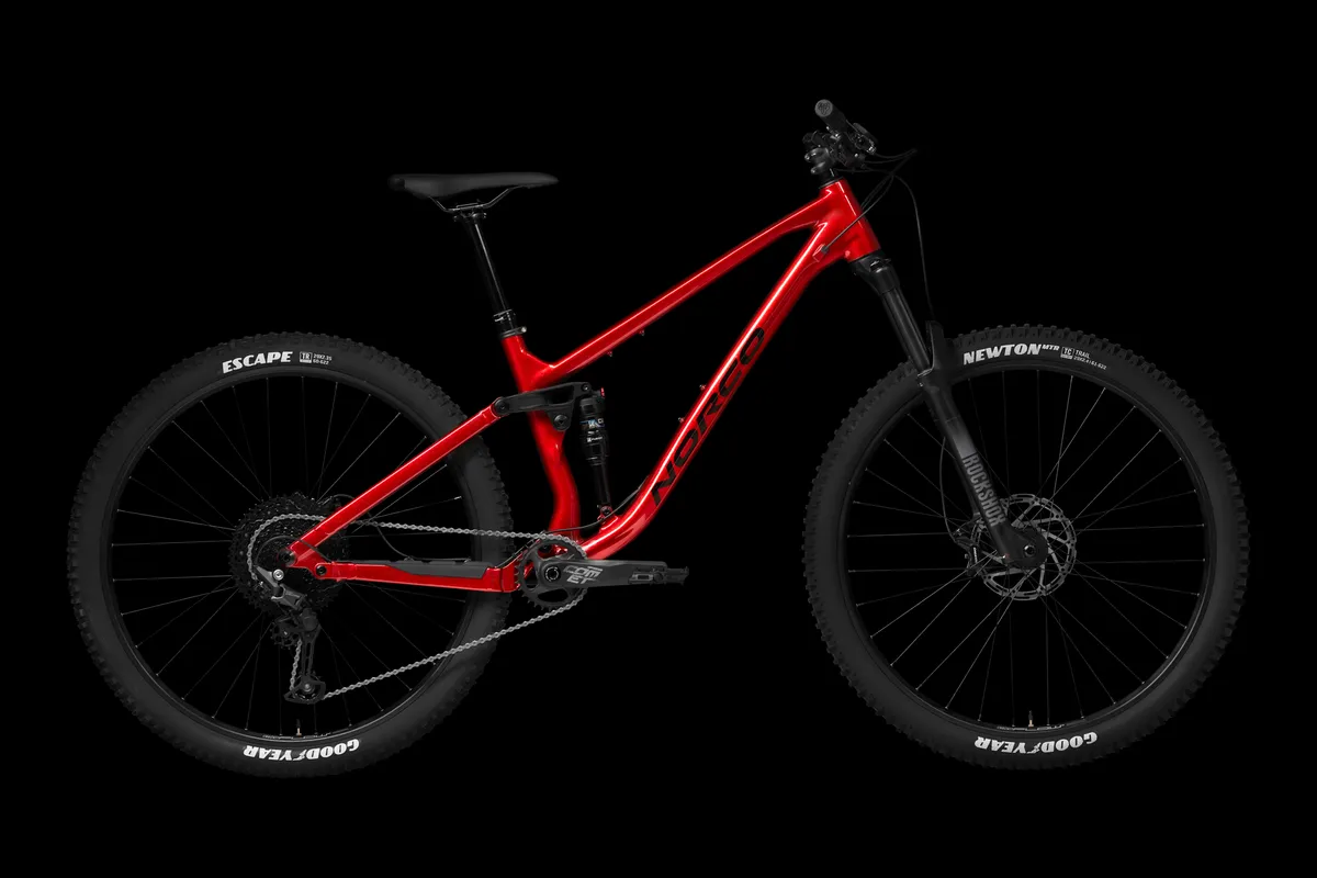 Norco Fluid FS 3 in Red Black against a black background