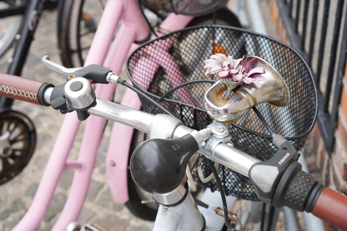 A bell and a horn on a child's bike