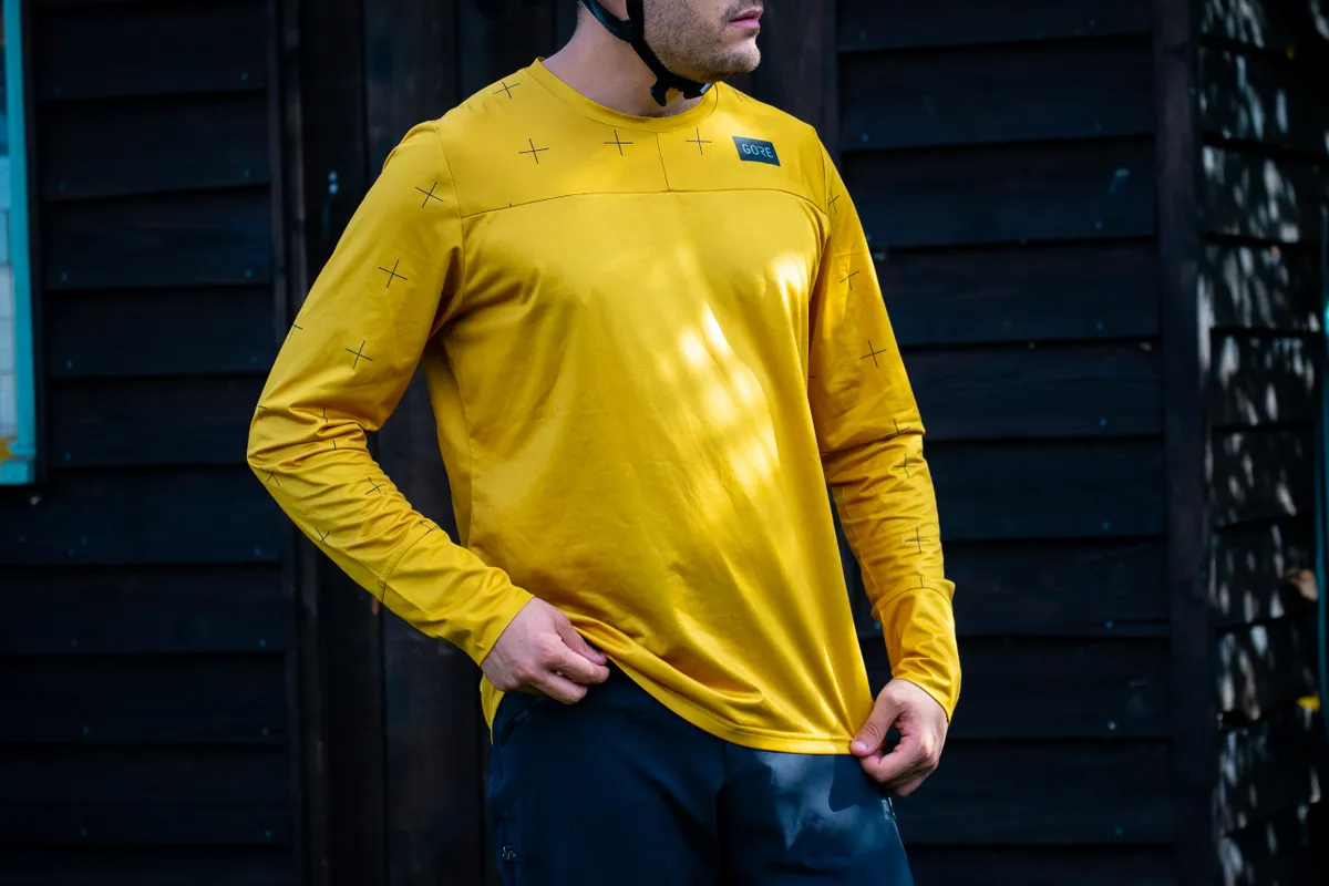 Model wearing yellow Gore jersey.